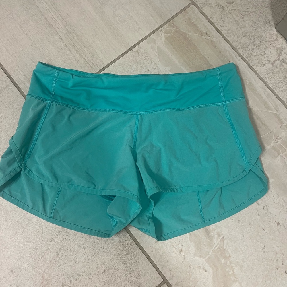 Like New Lululemon speed up 2” short in teal size 6